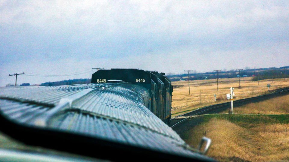 VIA Rail train approaching crossing