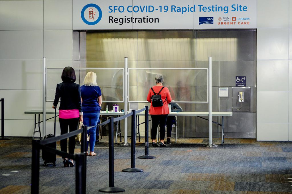 Passengers lining up for their pre-booked rapid COVID-19 test on site at San Francisco International Airport.