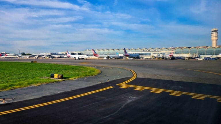Different planes standing at different gates at the Washington National airport.